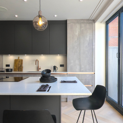 Graphite and Putty Concrete Kitchen in Finsbury Park