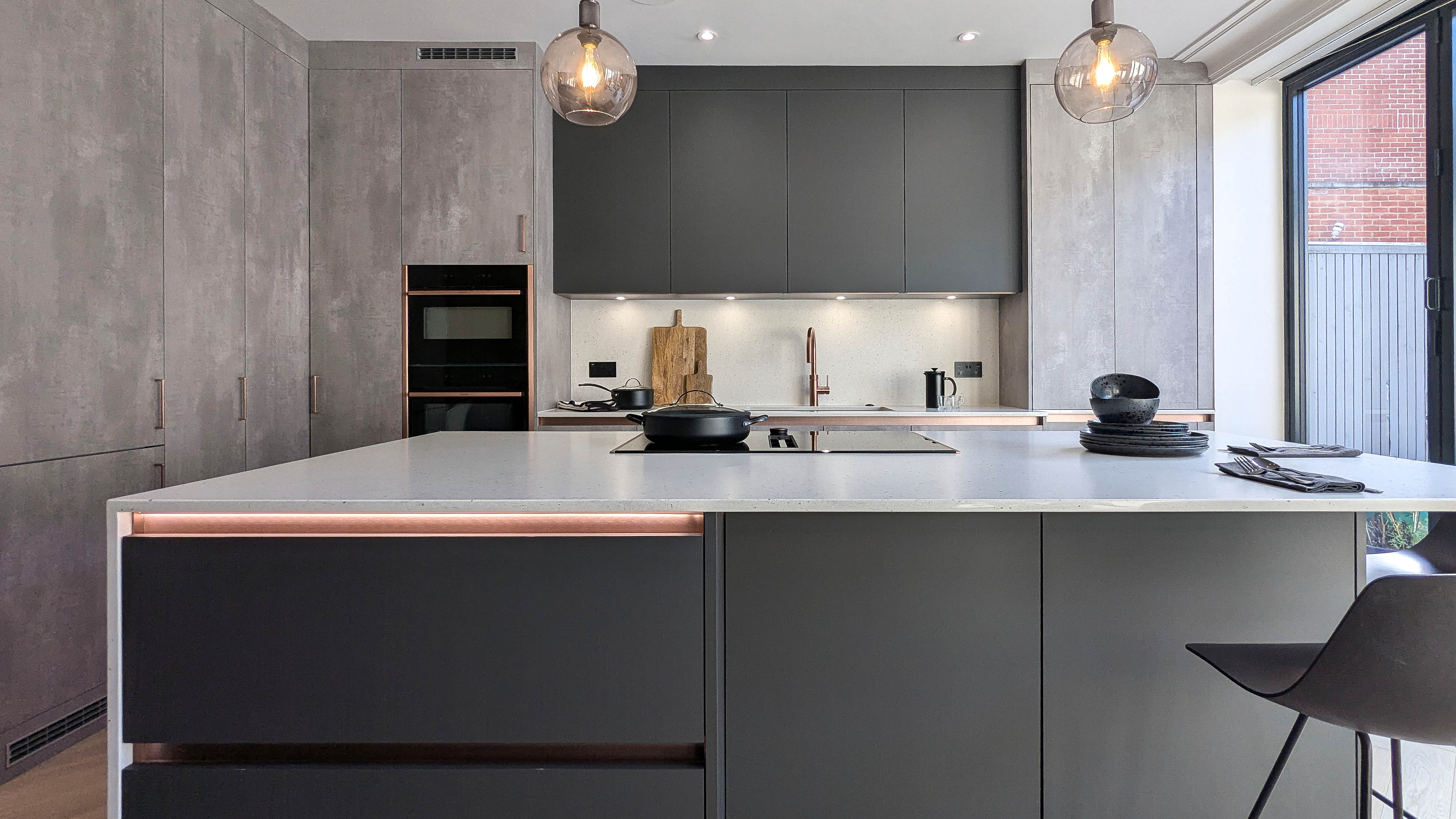 Graphite and Putty Concrete Kitchen in Finsbury Park